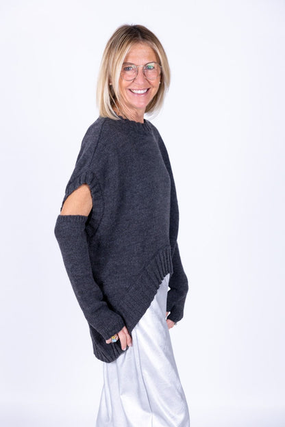 Tensione in - Gilet stondato con manicotti