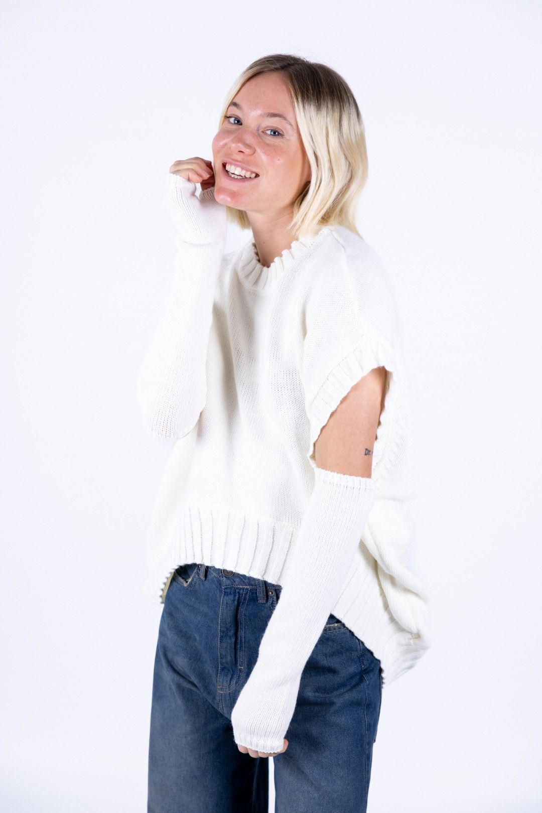 Tensione in - Gilet stondato con manicotti